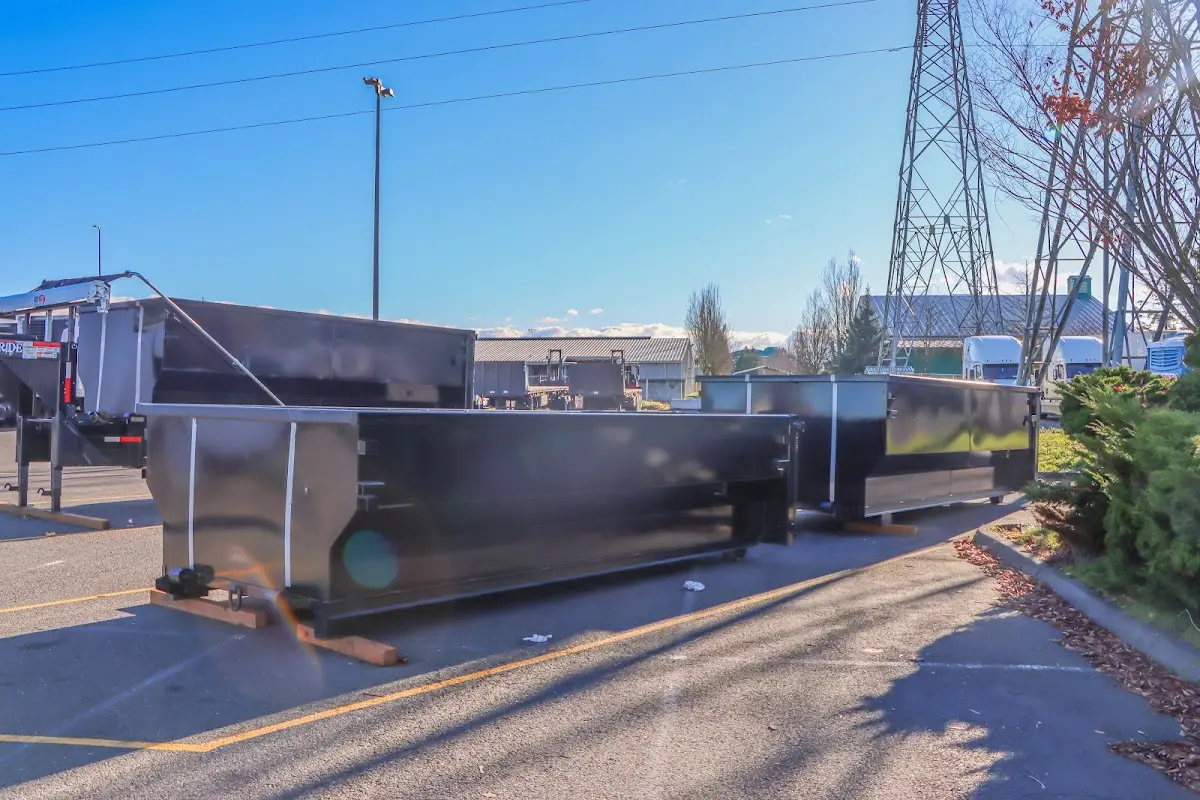 Roll-off dumpster ready for waste disposal at job site for 2 Yard Dumpster Rental in Barnstable Town